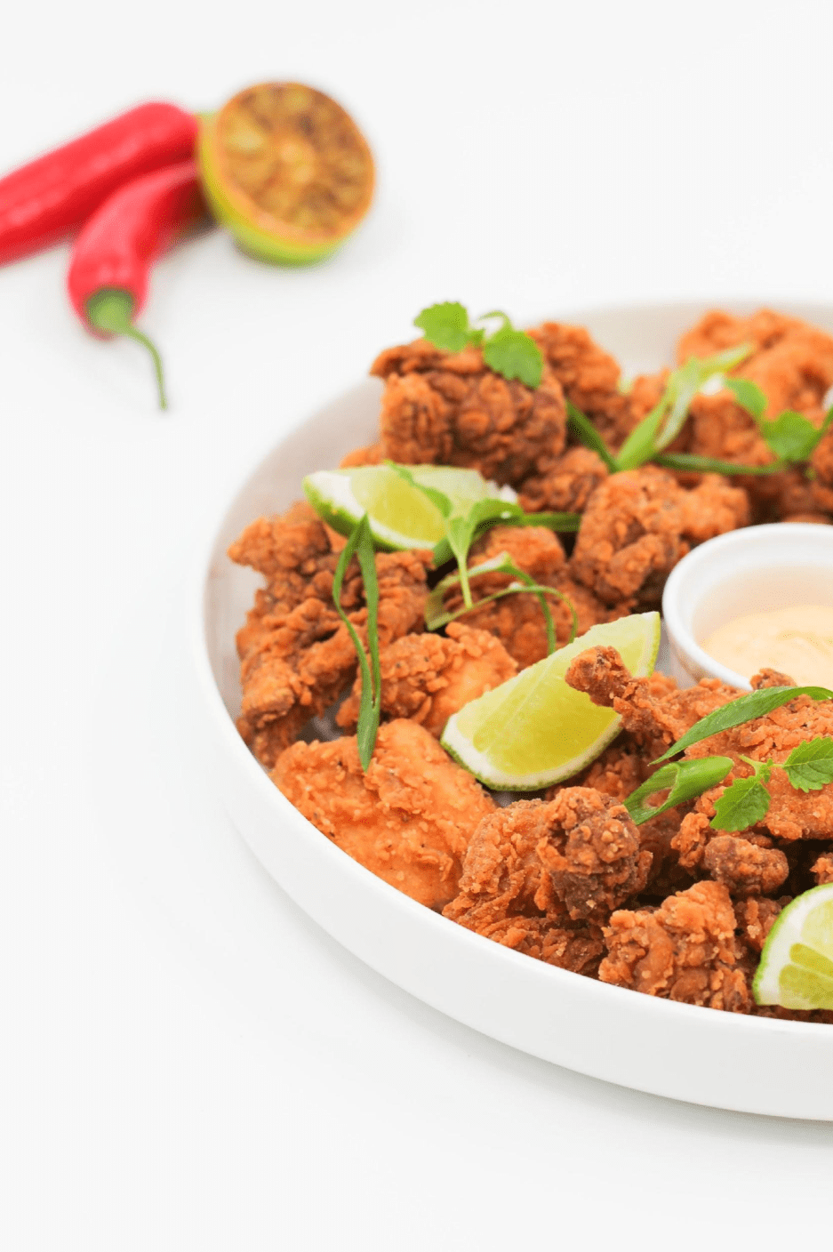 karaage fried chicken, sriracha mayonnaise, fresh lime